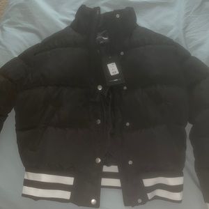 Fashionova puffer jacket . Never worn . Tag still on item size Small
